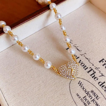 ✨Nouveauté✨Collier de perles en forme de cœur magnétique